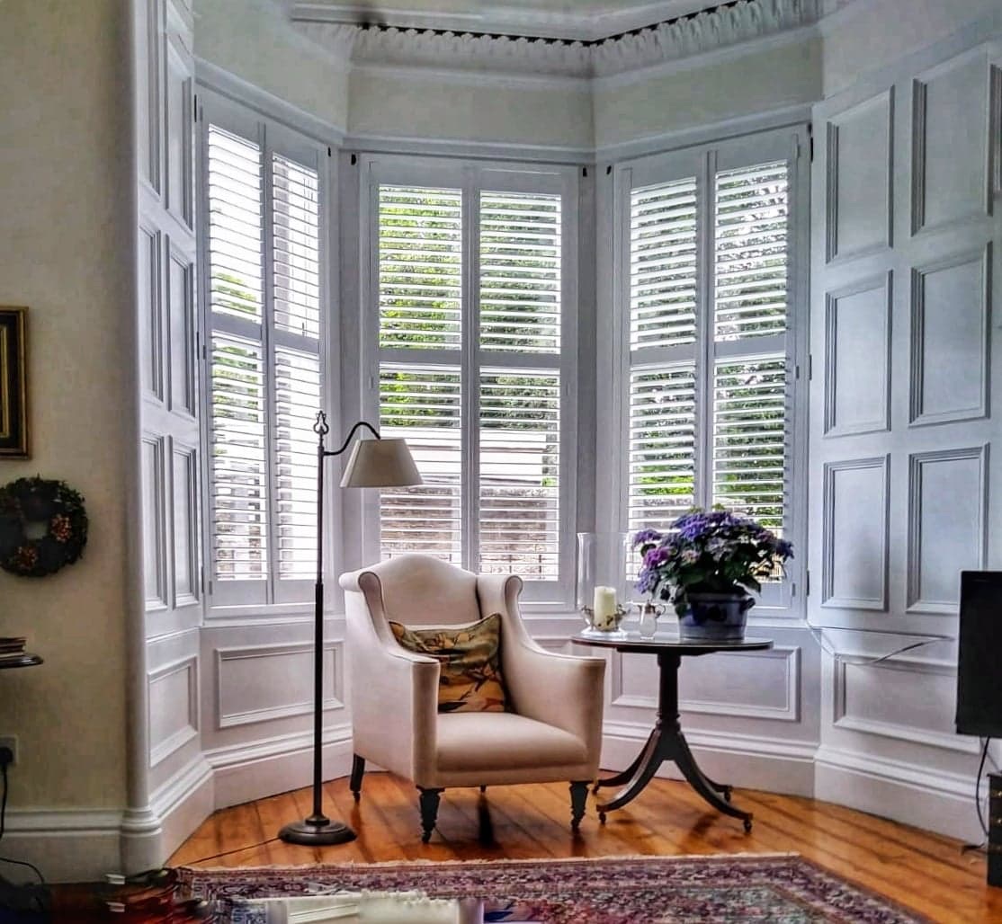Made-to-measure bay window plantation shutters fitted in a Norfolk home